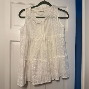 Caren Forbes white blouse